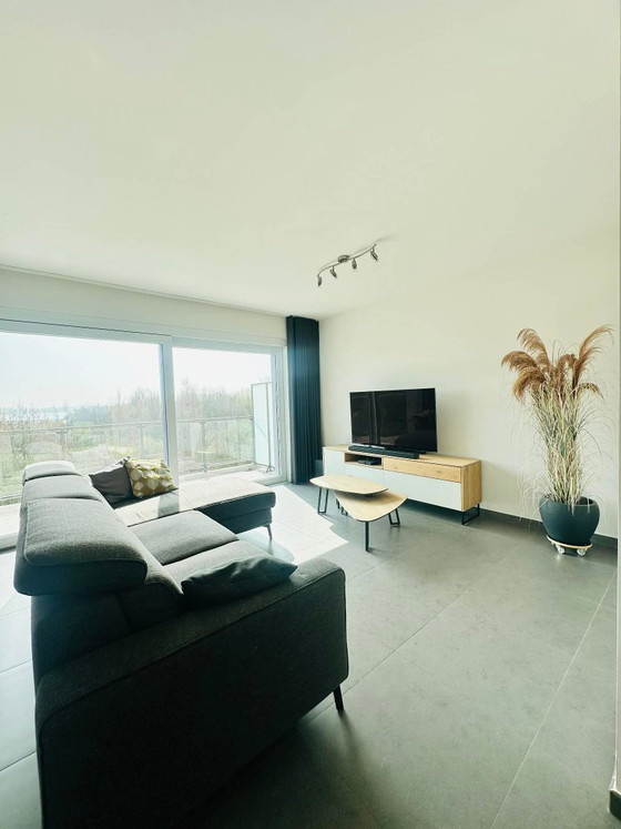 Image 1 of Ensemble XOOON Darwin : buffet, meuble TV, table et chaises, table basse, table à manger et fauteuil.