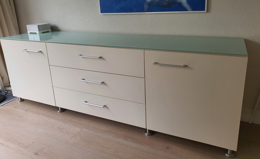 White modern sideboard with a separate glass top. Heavy-duty quality.