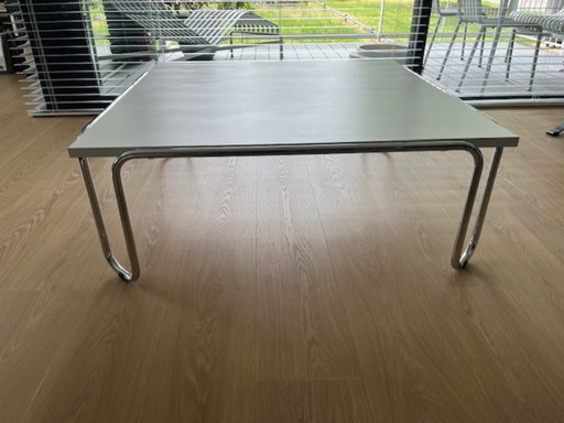 Coffee table with loose marble top