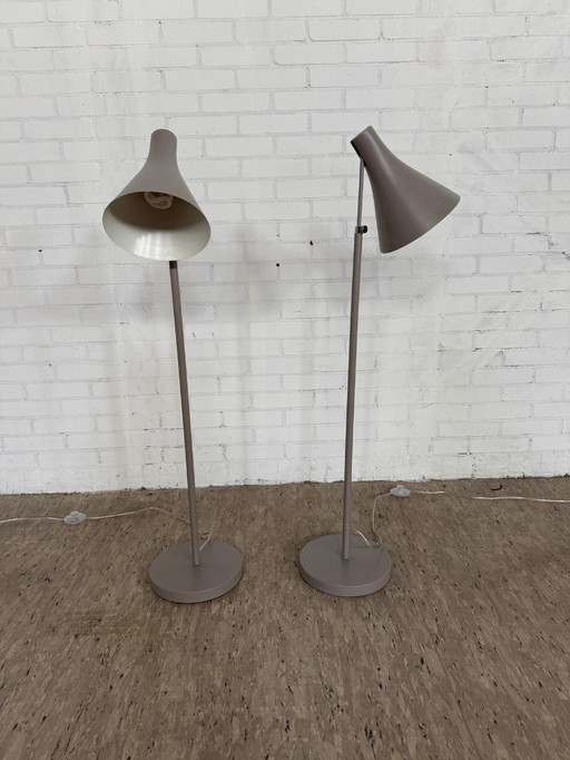 Two Philips floor lamps in gray