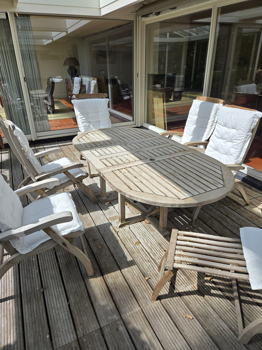 Set da giardino in teak con 6 sedie regolabili.