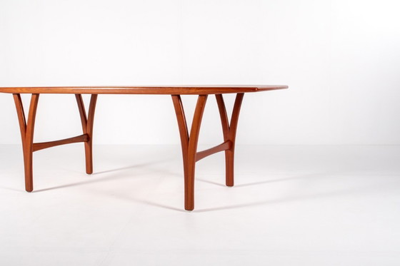 Image 1 of Grote Deense teakhouten salontafel, jaren 60