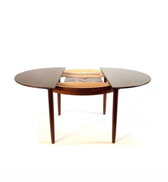 Image 1 of Vintage Rosewood extendable dining table '60