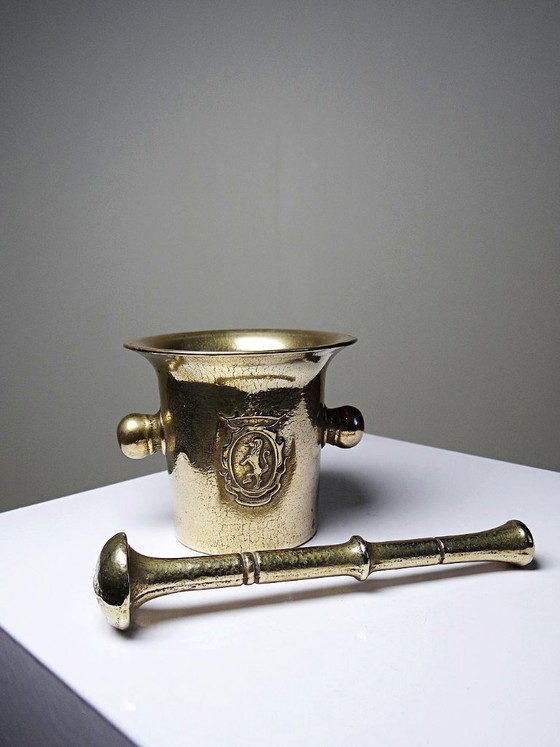 Image 1 of Gilt bronze apothecary's mortar and pestle with heraldic decoration, 20th century