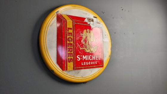 Image 1 of Enamel sign St Michel Cigarettes, 1953 