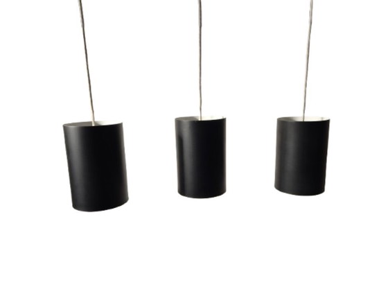 Image 1 of 6 Louis Poulsen "pipe" pendant lights, 1960s, lacquered steel
