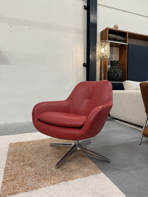 Sillón giratorio Leolux Pode Sparkle de piel roja