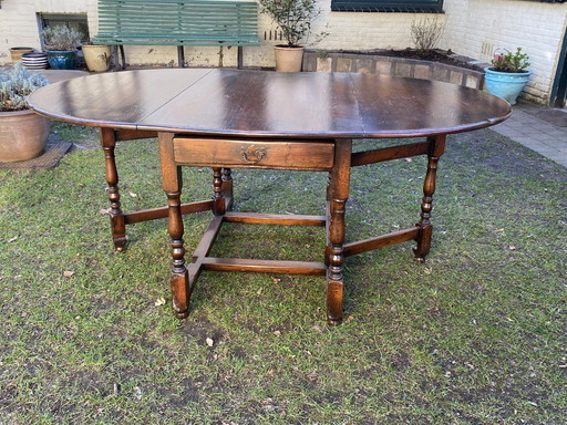 Antique English gateleg table, solid wood, oval, extendable