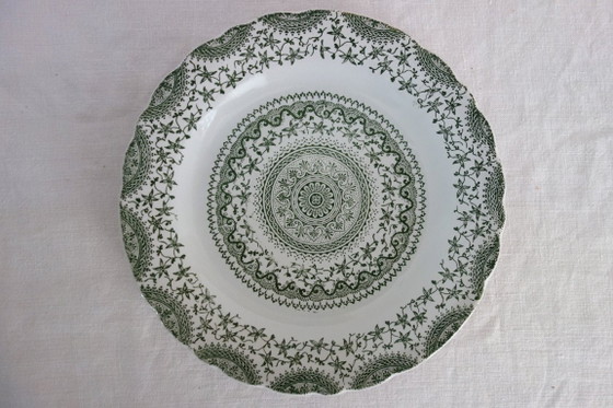 Image 1 of 8 platos llanos de loza