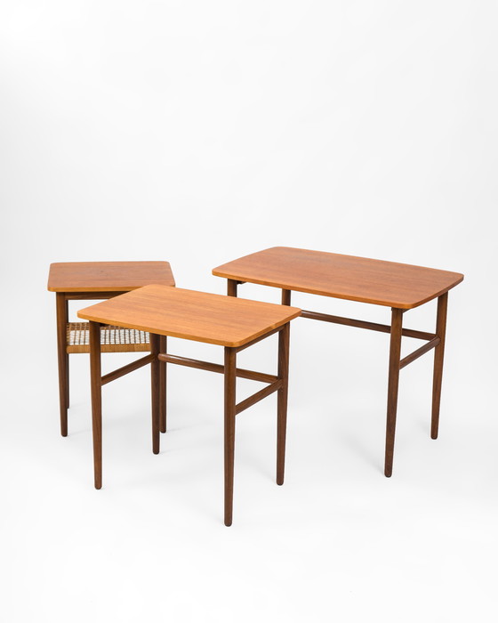 Image 1 of Mid Century Danish Nesting Tables Made Of Teak And Rattan