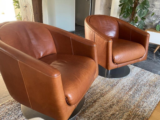 Twee Natuzzi Draai Fauteuils in Leder