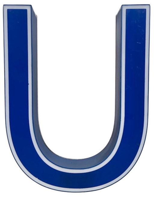 Industrial dark blue enamel factory pendant light made in United Kingdom during the 1950s. White enamel inside the shade. Brass 