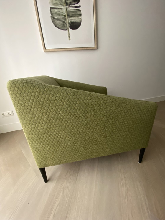 Image 1 of Sijben armchair in moss green fabric with matte black steel legs.