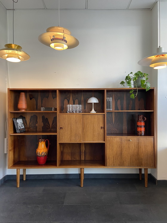 Image 1 of Vintage Rosewood Bookcase With Sliding Doors and Bar