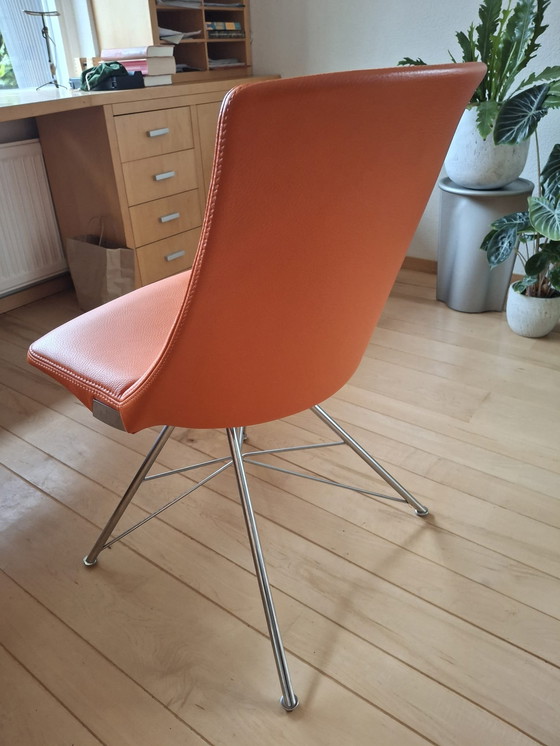 Image 1 of Orangefarbener Lederstuhl mit Metallbeinen