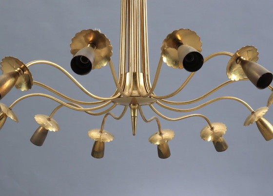 Image 1 of Lustre en laiton attribué par Oscar Torlasco 1970