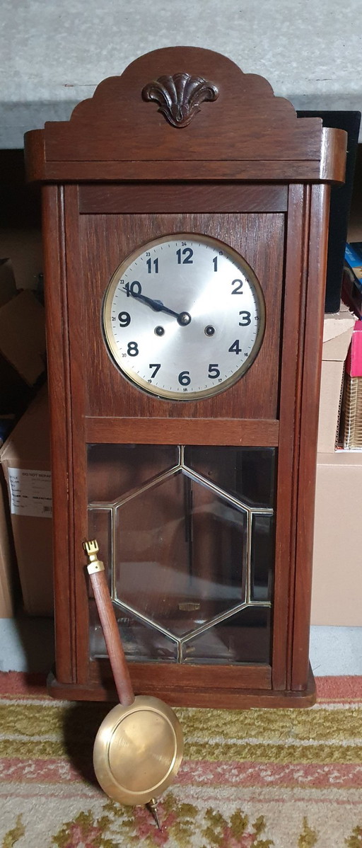 Vintage 1950s wall clock with manual regulator