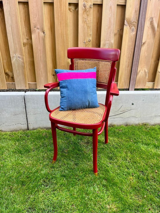 Image 1 of Vintage design stoel – rood & rotan – gerestyld door Ontwerpstudio Anna