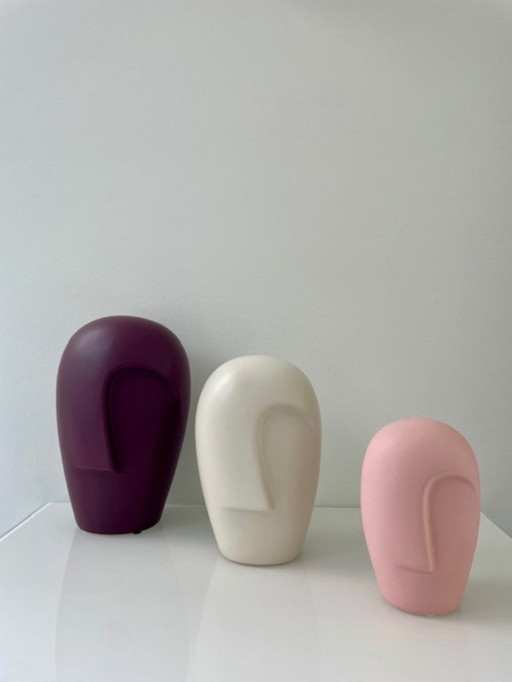 Set of 3 modern sculptural vases with stylized faces