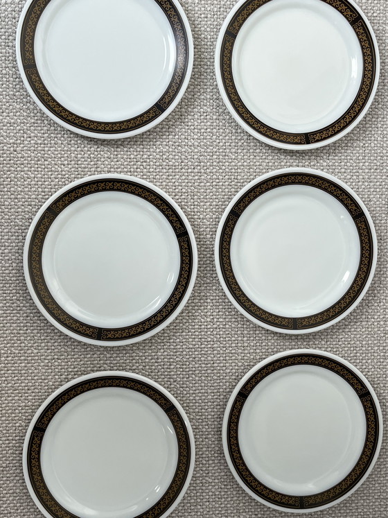 Image 1 of 6 PYREX Fleur-de-Lis Teller schwarz/gold 20 cm