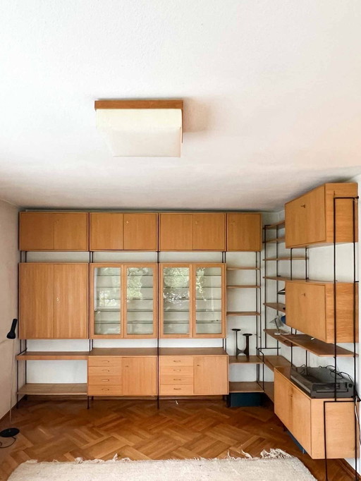 Large Ernest Hilker “OMNIA” modular wall shelf Omnia” modular wall shelf designed by Ernst Hilker, Germany, circa 1960. 