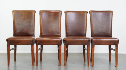 4 x Dining chair made of sheep leather with ornamental nail finish
