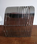 Harmonica magazine rack