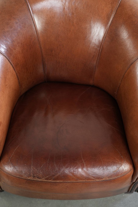 Image 1 of Mooie vintage schapenleren clubfauteuil in Engelse stijl met prachtige diepe kleuren