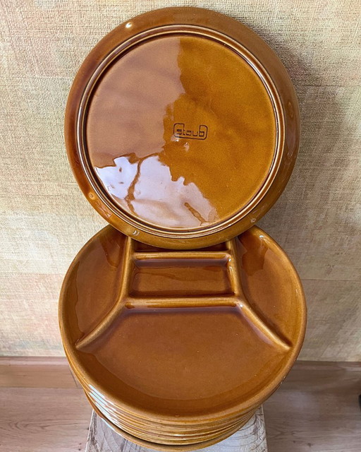 12 vintage Staub fondue plates