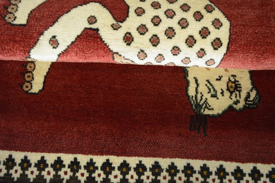 Image 1 of Hand-knotted nomadic rug with tiger motif - Shiraz 118 x 85 cm | Wool, red & beige