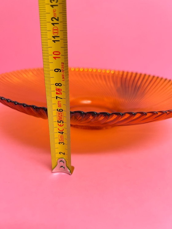 Image 1 of Vintage 70s swirl amber glass amber sunburst fruit bowl sawtooth edge orange