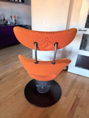 Varier Stokke Peel Oranje met hocker