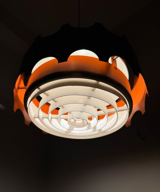 Image 1 of Hanglamp in zwart en koperkleurig design uit de jaren 60