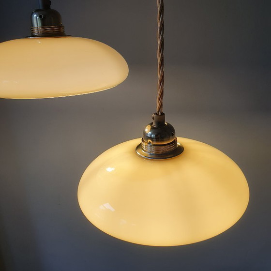 Image 1 of Vintage French pendant lamp set - of pastel yellow opaline glass.