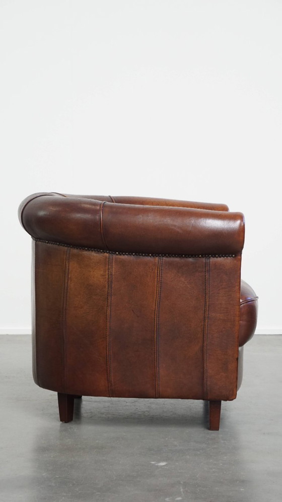 Image 1 of Sheep Leather Club Chair in a Dark Cognac Color