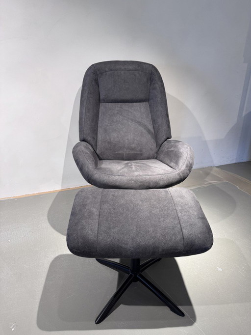 Poltrona Montel Shuffle con pouf