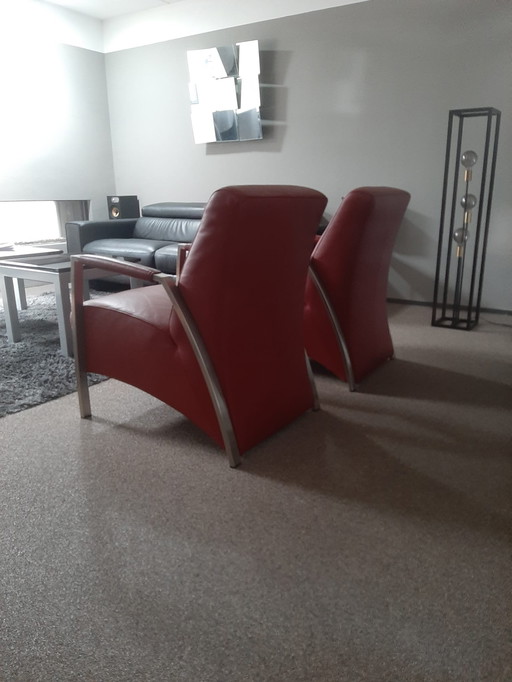 Te koop twee mooie soepel leren stoelen met RVS