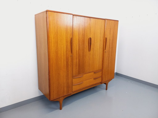 Scandinavian-style vintage cabinet in teak from the 60s by designers Tricoire and Vecchione for the "Meubles TV Paris" brand.