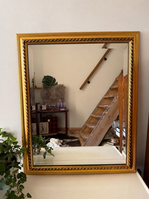 Facet geslepen vintage spiegel met goudkleurige lijst