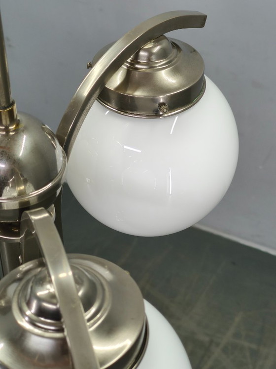 Image 1 of Art Deco kroonluchter uit de jaren 30 van nikkel met opaalglazen bollen.