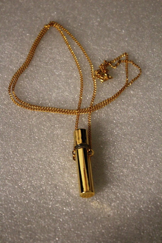 Image 1 of Jovan parfumhanger met ketting, goudkleurig, met glazen flesje, vintage, zeldzaam