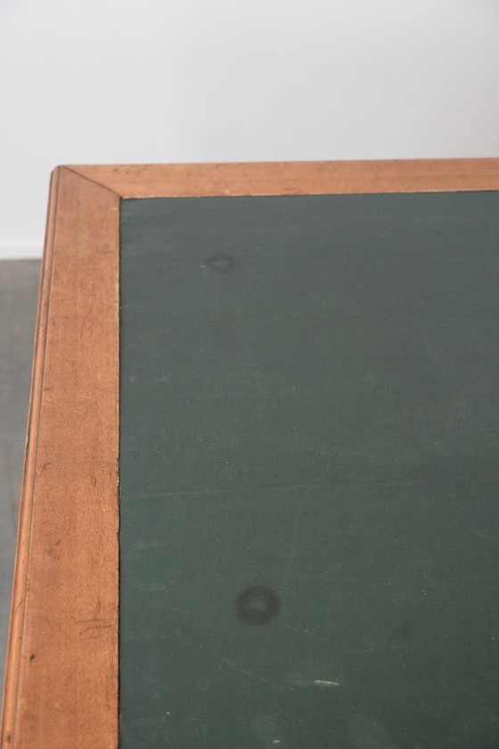 Image 1 of Antique writing table/partner desk with 4 drawers and a green leather top
