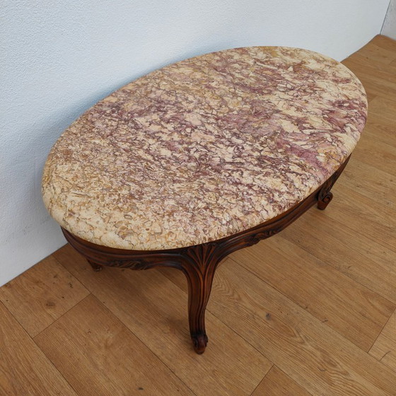 Image 1 of Vintage Oval Wooden coffee table with onyx marble top
