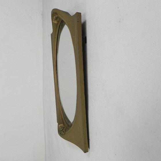Image 1 of Gold oval mirror with cut edge, 1950s