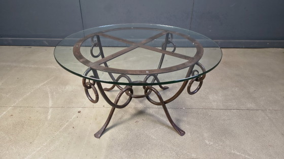 Image 1 of Smeedijzeren salontafel van René Drouet, jaren 1940.