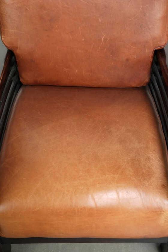 Elegant cowhide armchair with beautiful details in timeless Art Deco design – Leather, Klassiek (photo 6 of 12)