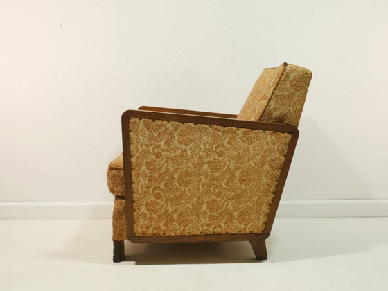 Image 1 of Vintage fauteuil uit de jaren 50, originele mid-century modern stijl, houten armleuningen, vering, bloemenstof, Duitsland