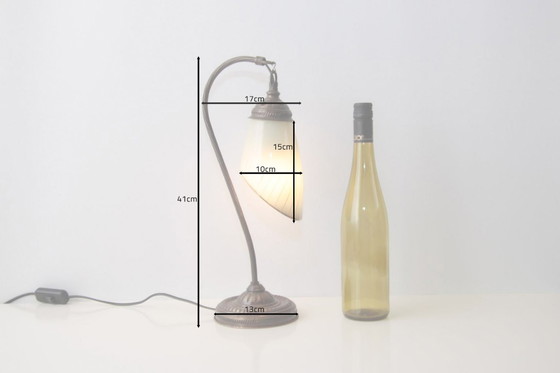 Image 1 of Vintage brass table lamp with curved arm and glass shade