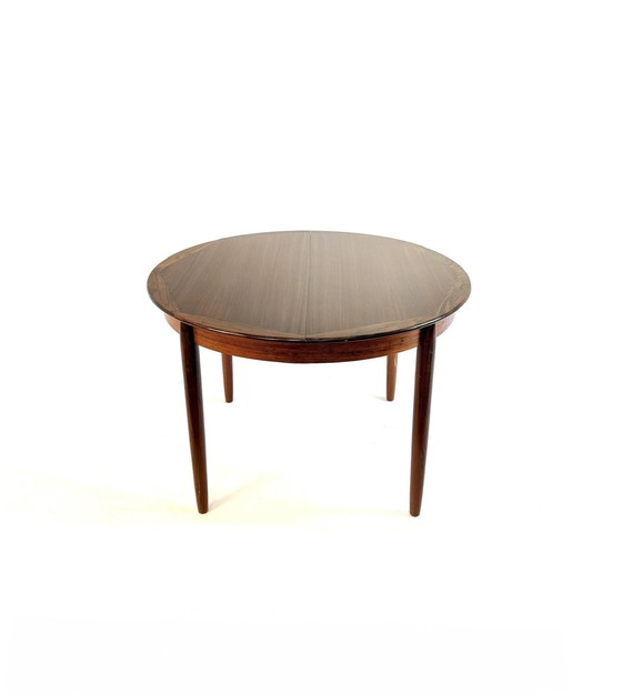Image 1 of Vintage Rosewood extendable dining table '60