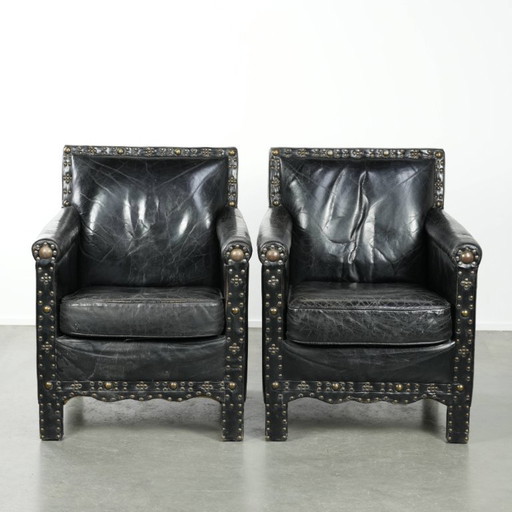 2 x Unique, special, elegant cowhide armchair with leather legs